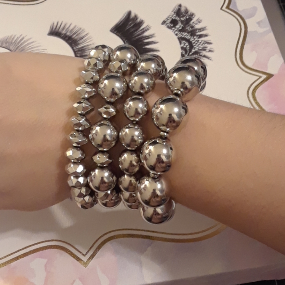 Set of 4 Silver Tone Stretch Bracelets